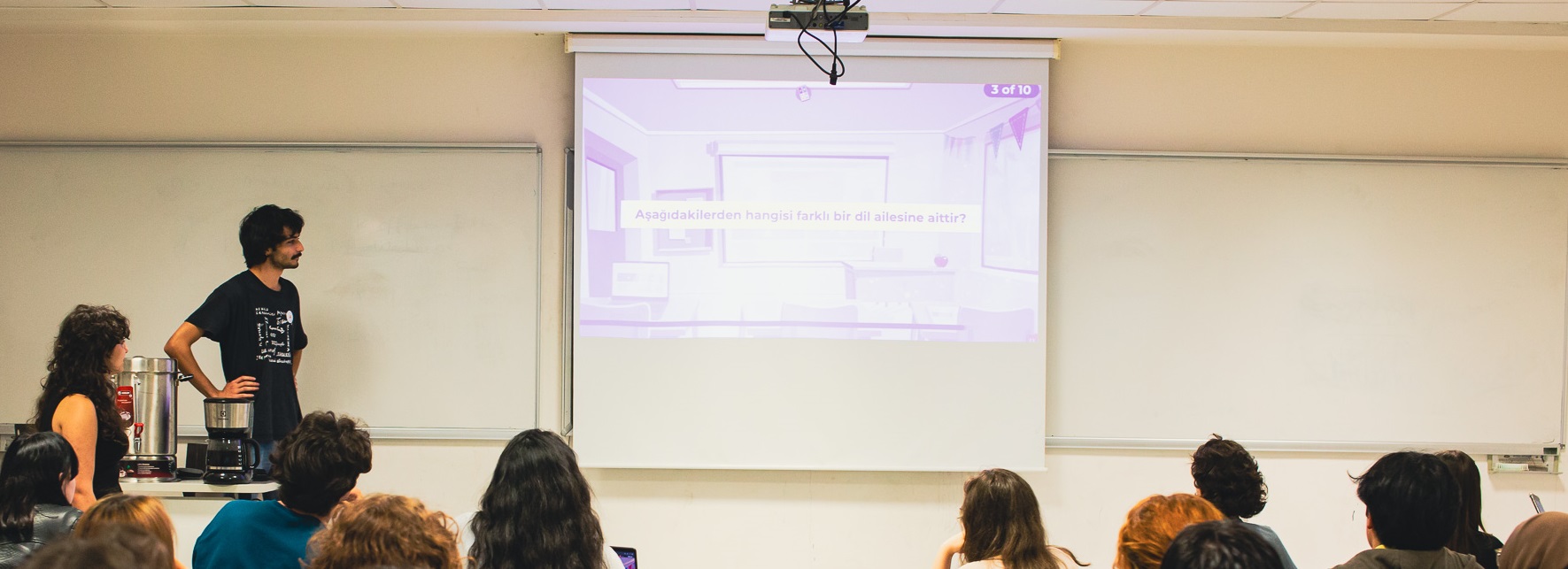 Picture of me from the 2024 Meet&Greet tea of BULING doing a Kahoot.